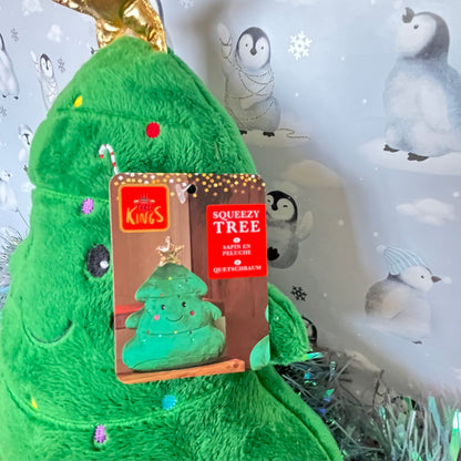 Festive green Squeezies Christmas tree plush toy