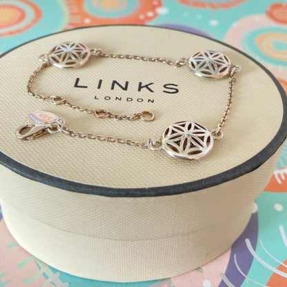 Links of London Bracelet featuring 3 disks with the Flower of Life Design. 20cm adjustable