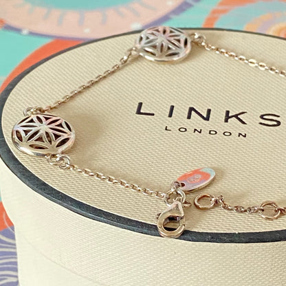 Links of London Bracelet featuring 3 disks with the Flower of Life Design. 20cm adjustable