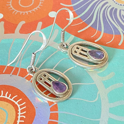Sterling Silver lovely Earrings with a Purple Sparkly Stone