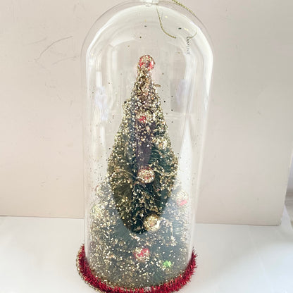 Christmas Tree Decoration in a Glass Dome. Beautiful Holiday Decoration