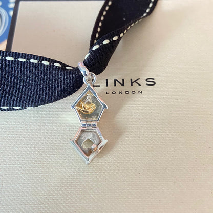New! Links of London Bird House Charm crafted from Sterling Silver with a Gold 18k Vermeil Bird