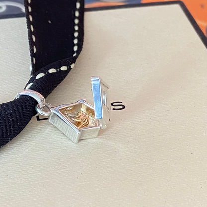 New! Links of London Bird House Charm crafted from Sterling Silver with a Gold 18k Vermeil Bird