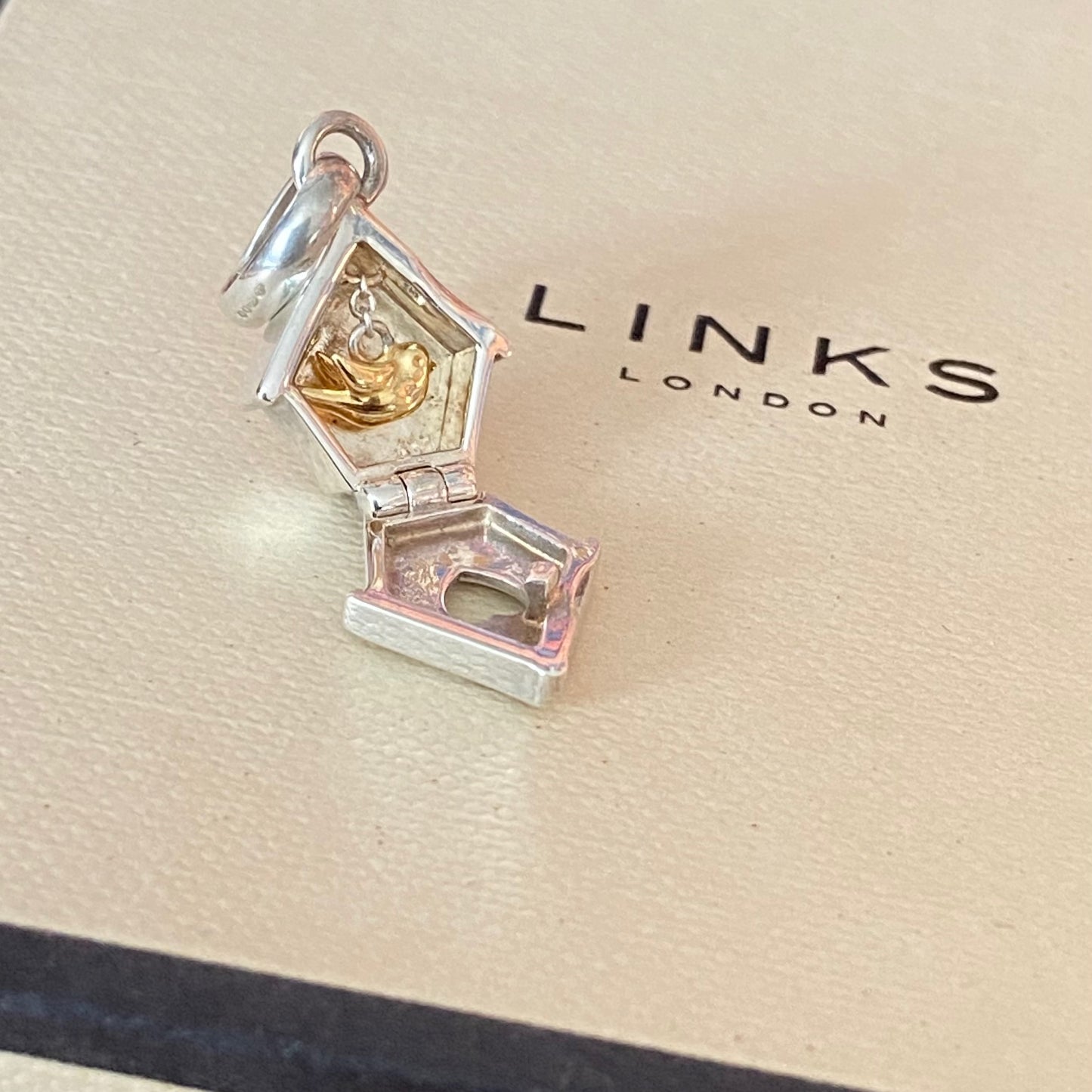 New! Links of London Bird House Charm crafted from Sterling Silver with a Gold 18k Vermeil Bird
