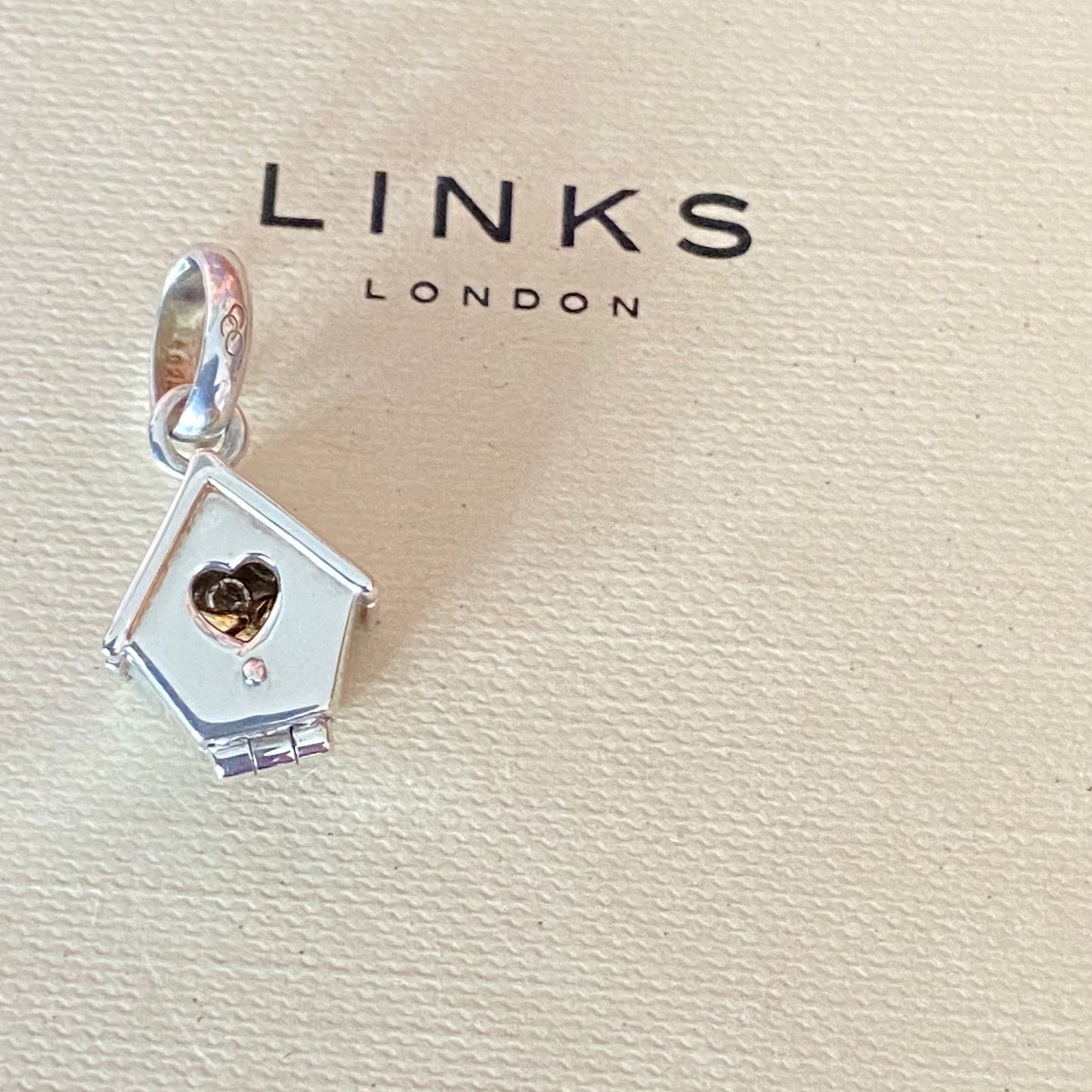 New! Links of London Bird House Charm crafted from Sterling Silver with a Gold 18k Vermeil Bird