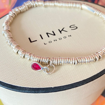 Dainty Links of London Sweetie Bracelet with Ruby Mini Birthstone Charm.