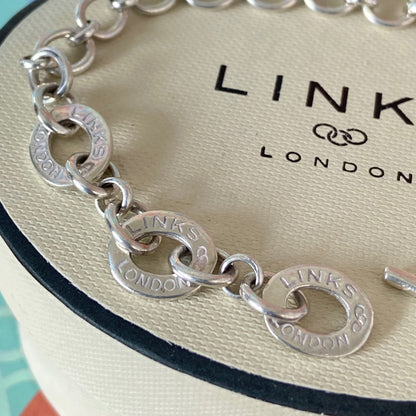 Links of London Bracelet with 3 Links of London Links with a T Bar Clasp and Smudge Heart