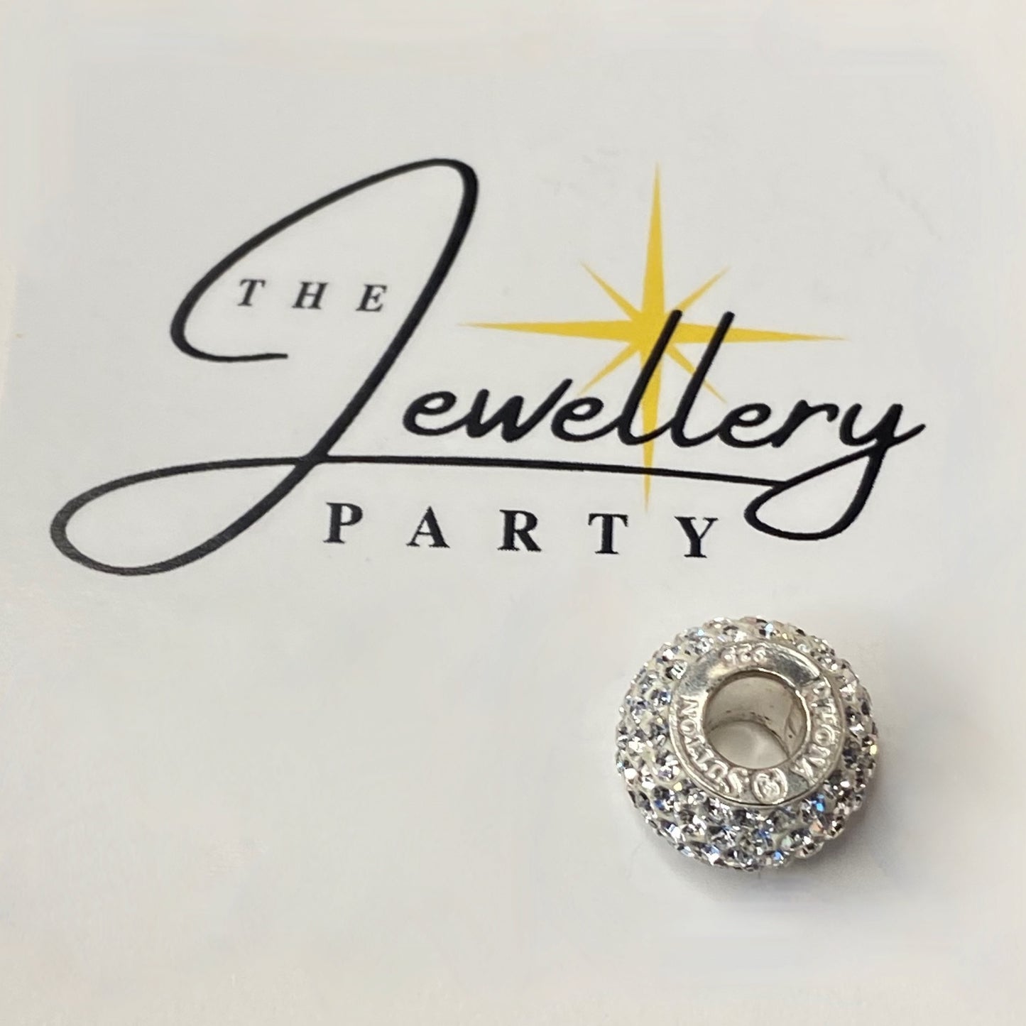 Silver charm with pave- set cubic zirconia Design by Rhona Sutton Crafted in Sterling Silver