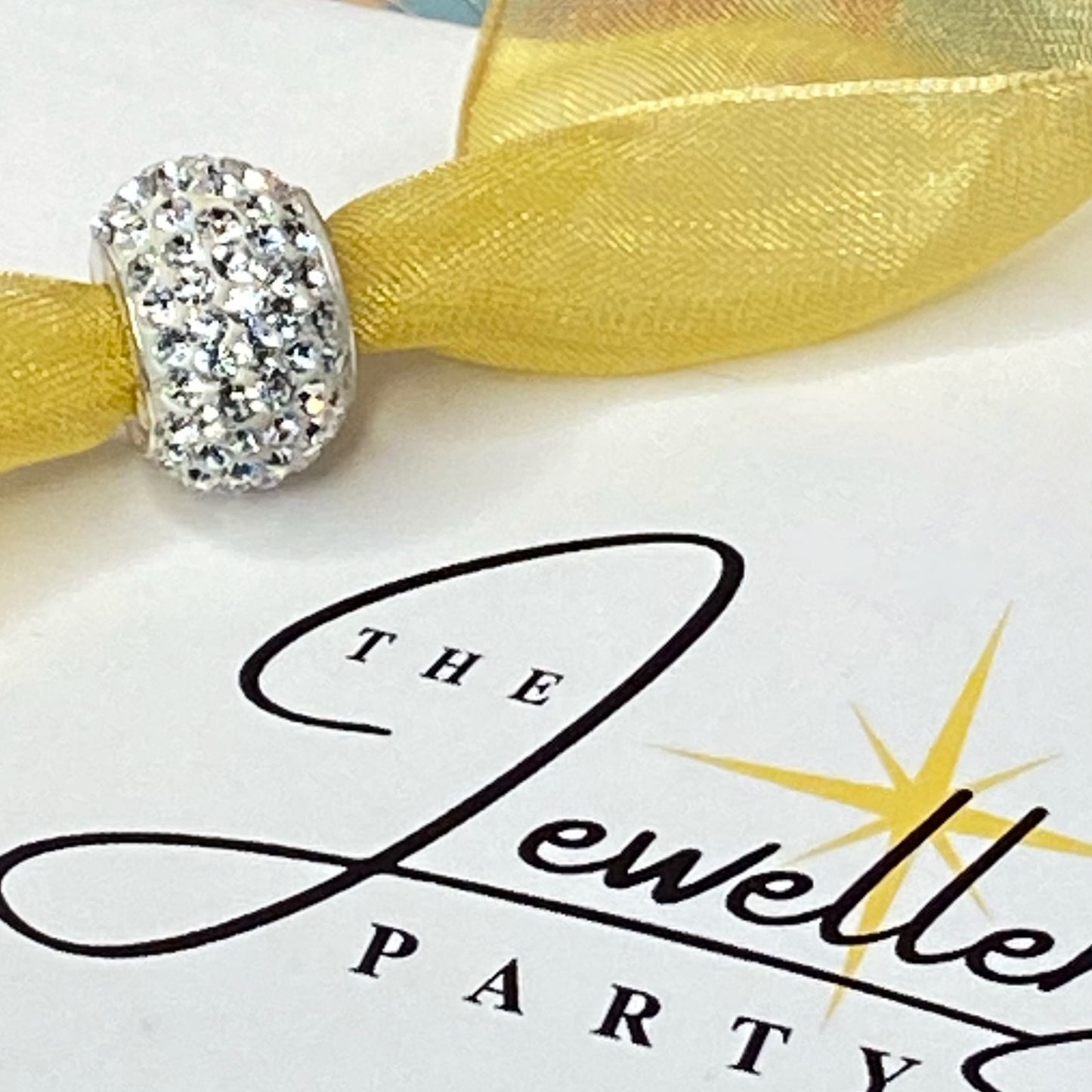 Silver charm with pave- set cubic zirconia Design by Rhona Sutton Crafted in Sterling Silver