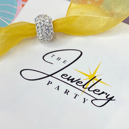 Silver charm with pave- set cubic zirconia Design by Rhona Sutton Crafted in Sterling Silver