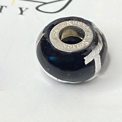 Black charm with Silver Stripe and cross Design by Rhona Sutton Crafted in Sterling Silver