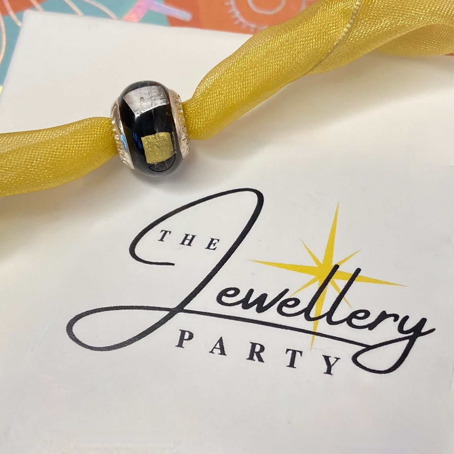 LoveLinks Black Charm Bead with yellow and white square design Crafted from Sterling Silver and Murano Glass