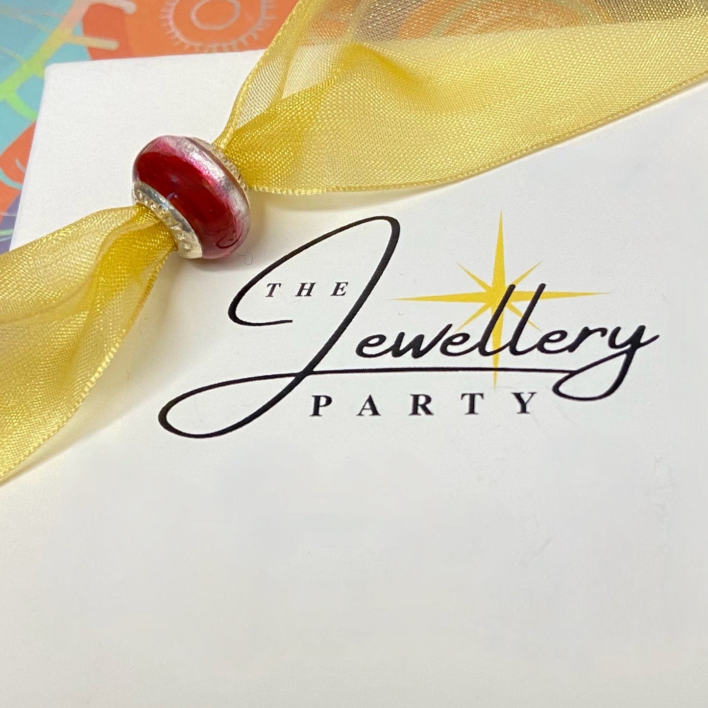 LoveLinks Deep Red Charm Bead with a white silvery stripe Crafted from Sterling Silver and Murano Glass