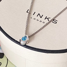 Load image into Gallery viewer, Links of London Blue Topaz Tear Drop Pendent on a beautiful T Bar  Hallmarked Necklace
