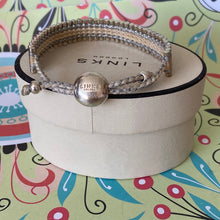 Load image into Gallery viewer, Links of London Sterling Silver cream and silver adjustable Friendship Bracelet
