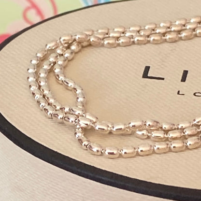 Links of London featuring 3 rows of Rice beads Bracelet 18.5CM