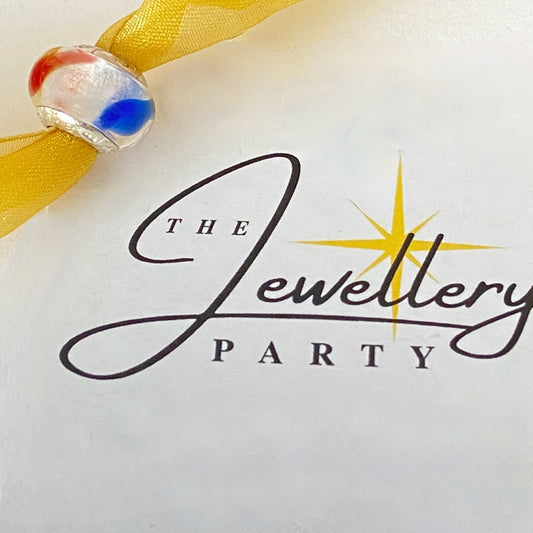 LoveLinks white  Bead design with dashes of yellow, blue and orange Crafted from Sterling Silver and Murano Glass