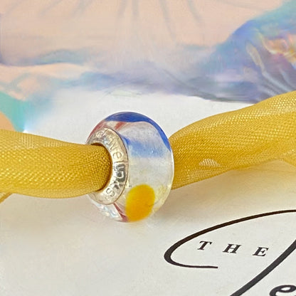 LoveLinks white  Bead design with dashes of yellow, blue and orange Crafted from Sterling Silver and Murano Glass