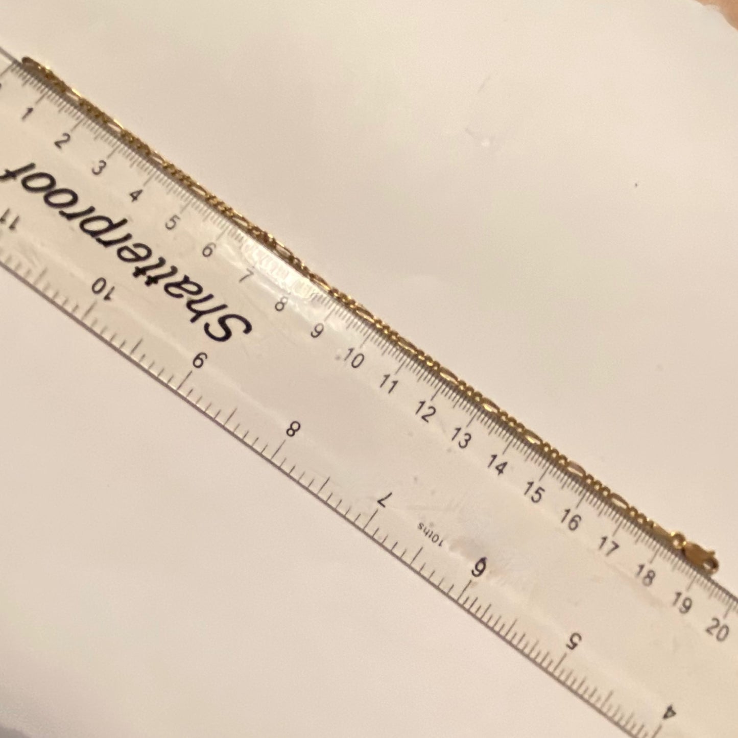 Delicate 9ct Gold Figaro bracelet