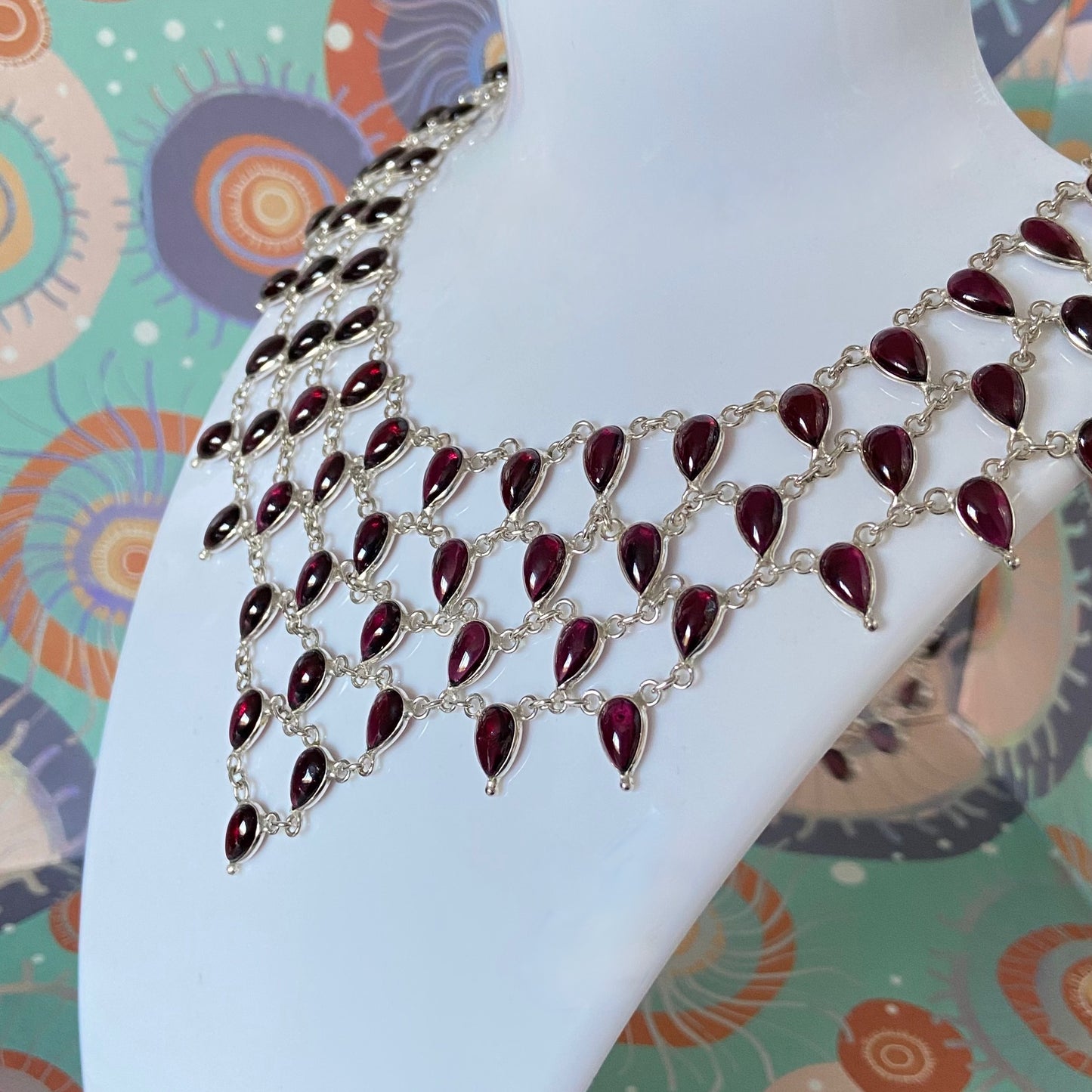 Stunning Statement Necklace crafted in Sterling Silver with Tear drop Garnets