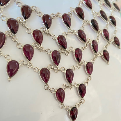 Stunning Statement Necklace crafted in Sterling Silver with Tear drop Garnets