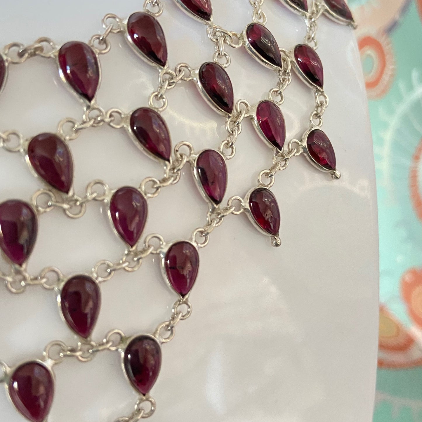 Stunning Statement Necklace crafted in Sterling Silver with Tear drop Garnets