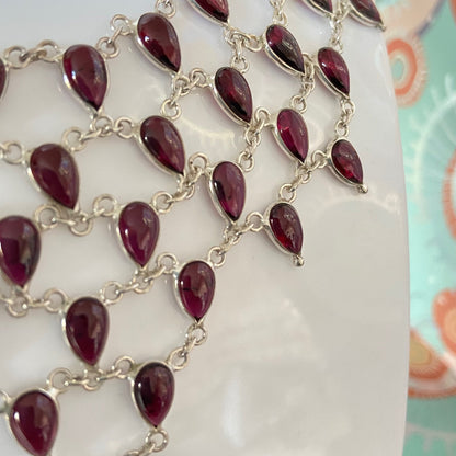 Stunning Statement Necklace crafted in Sterling Silver with Tear drop Garnets