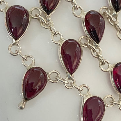 Stunning Statement Necklace crafted in Sterling Silver with Tear drop Garnets