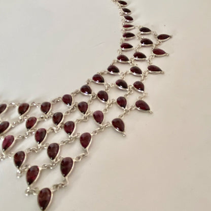 Stunning Statement Necklace crafted in Sterling Silver with Tear drop Garnets
