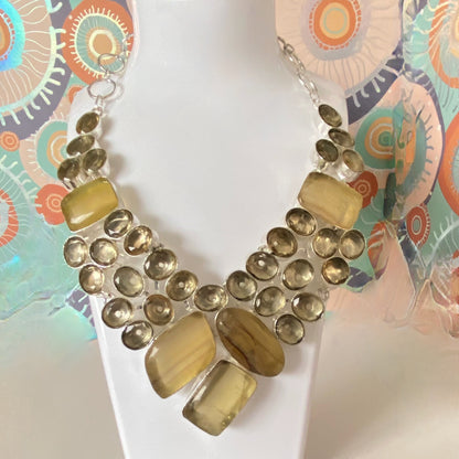 This lovely necklace covered in Fluorite Yellow Gemstones and Crystals