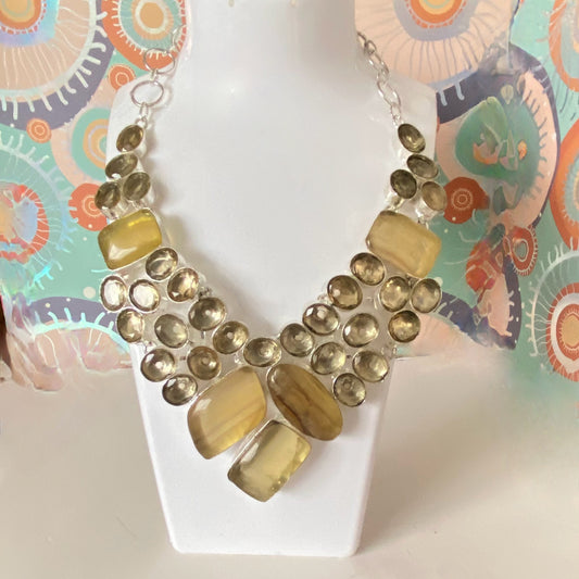 This lovely necklace covered in Fluorite Yellow Gemstones and Crystals