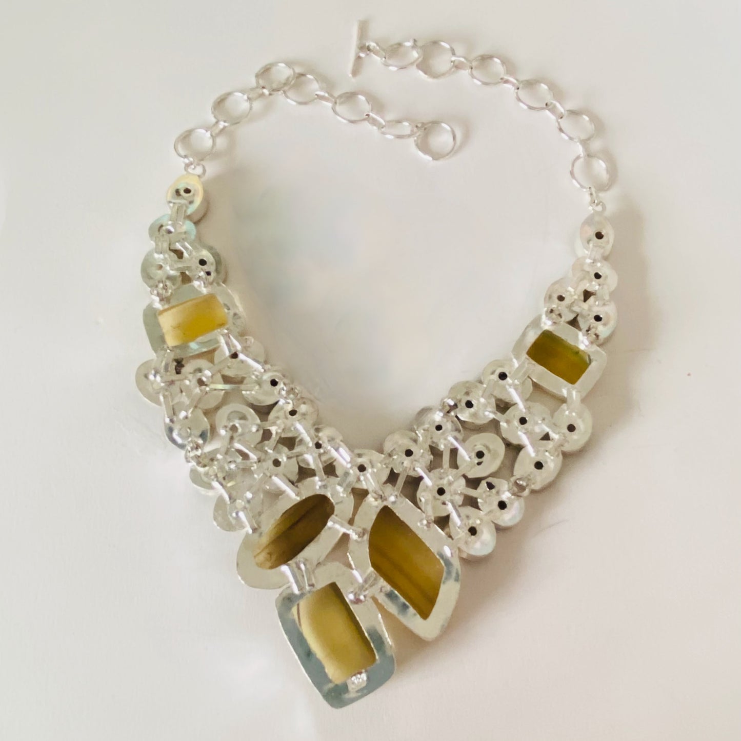 This lovely necklace covered in Fluorite Yellow Gemstones and Crystals