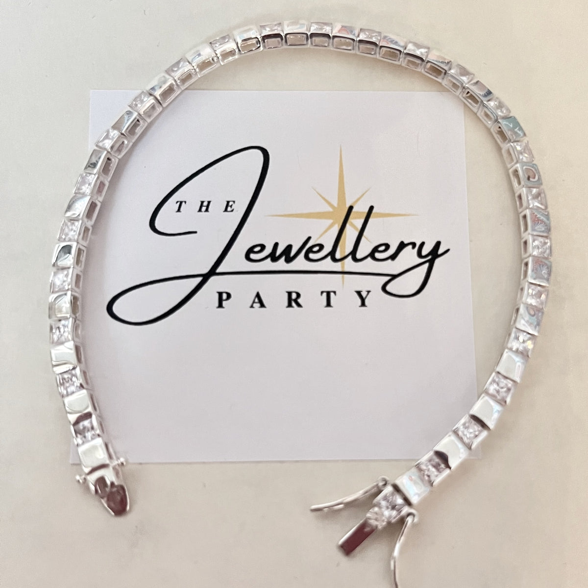 Sterling Silver 925 Clear Cubic Zirconia Gemstones Tennis bracelet with dashes of Silver squares