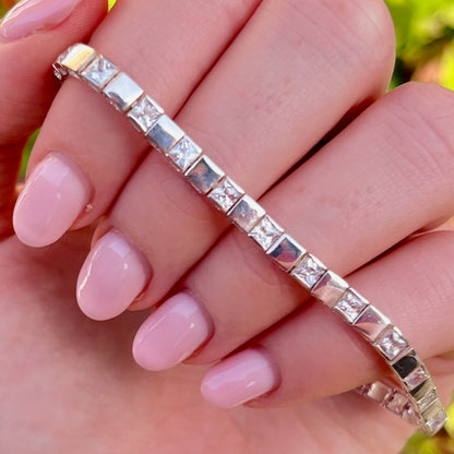 Sterling Silver 925 Clear Cubic Zirconia Gemstones Tennis bracelet with dashes of Silver squares