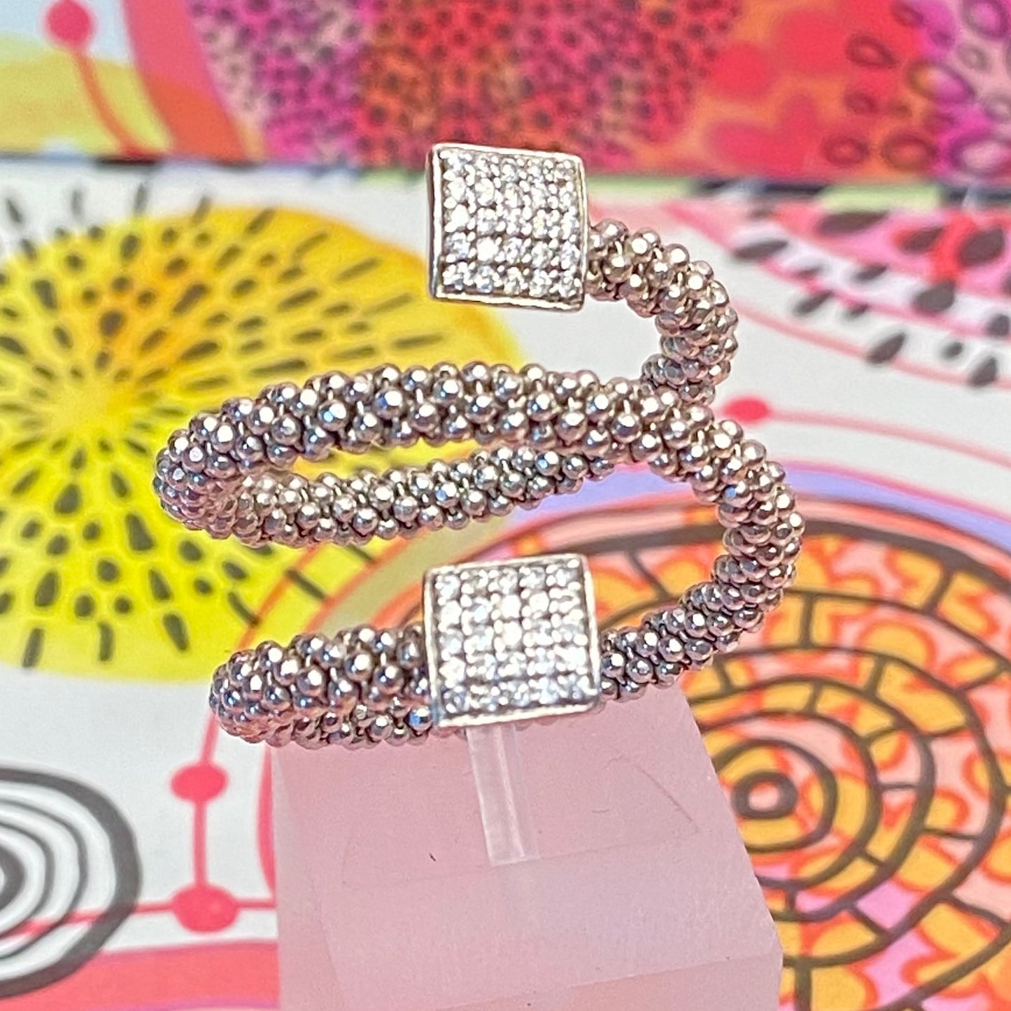 Links of London Sterling Silver Star Dust Wrap Ring with square barrels covered with Sparkly stones.