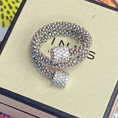 Links of London Sterling Silver Star Dust Wrap Ring with Round barrels covered with Sparkly stones.