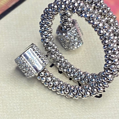 Links of London Sterling Silver Star Dust Wrap Ring with Round barrels covered with Sparkly stones.