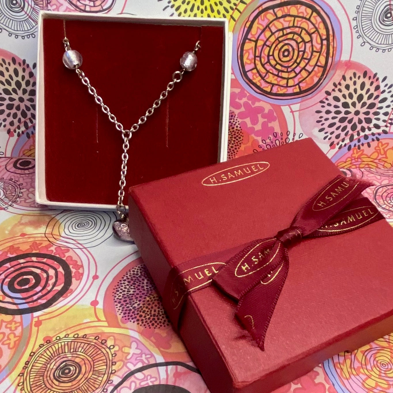 Sterling Silver chain with glass beads with a drop purple heart pendent