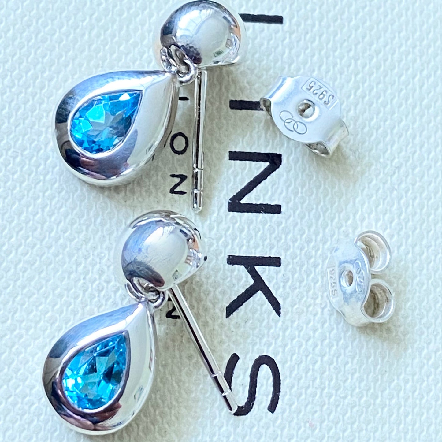 Links of London Sterling Silver Tear Drop Earrings with a Blue Topaz Tear Drop Stone with butterfly backs