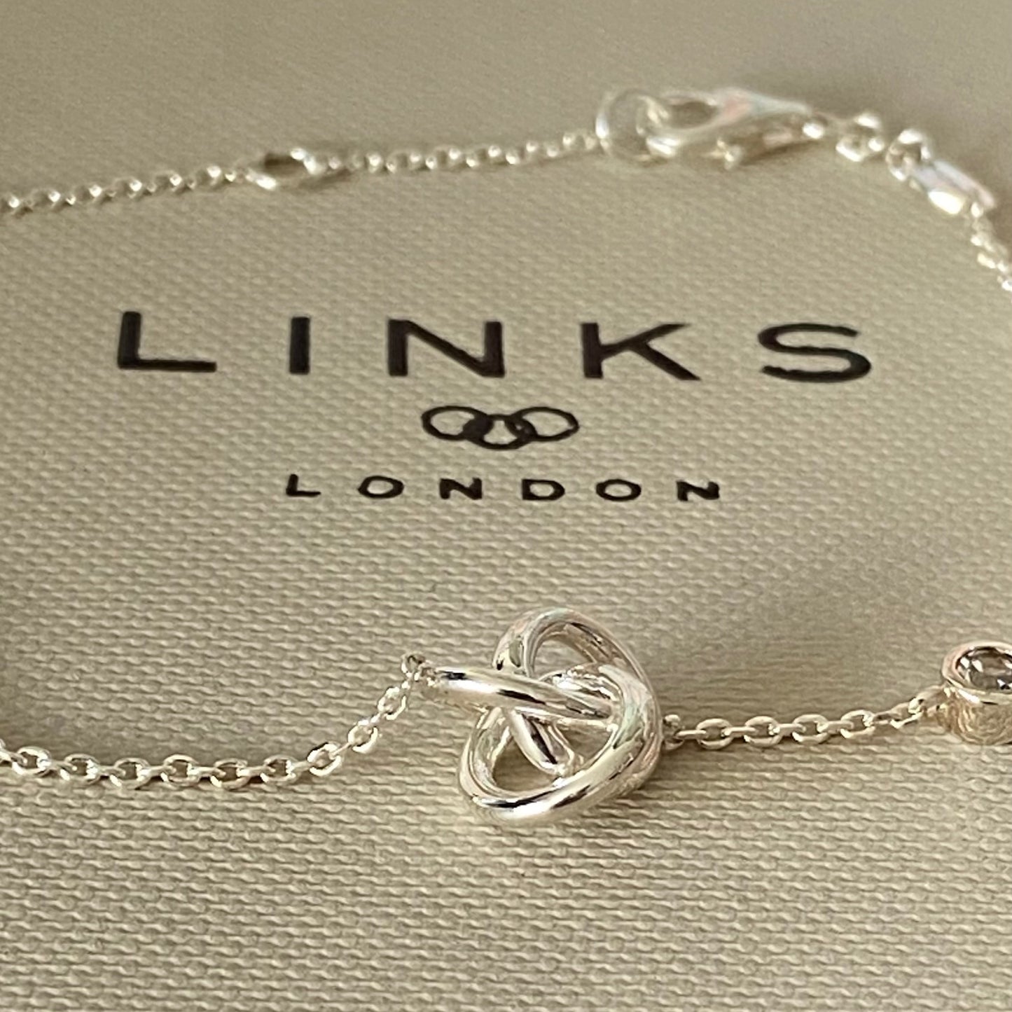 New! Links of London Love Knot Bracelet with a Topaz Sparkle Stone