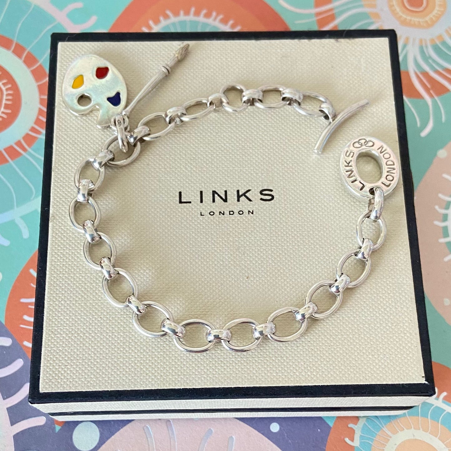 Links of London T-Bar Signature Bracelet with the Artist Pallet and Brush Charm.