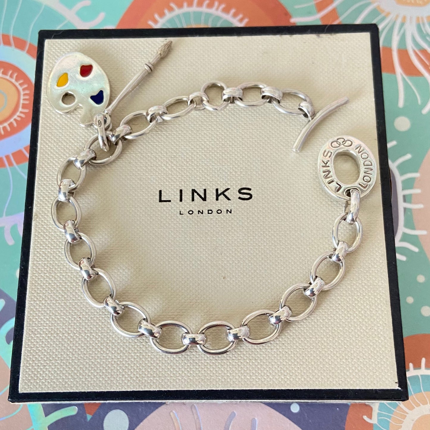 Links of London T-Bar Signature Bracelet with the Artist Pallet and Brush Charm.