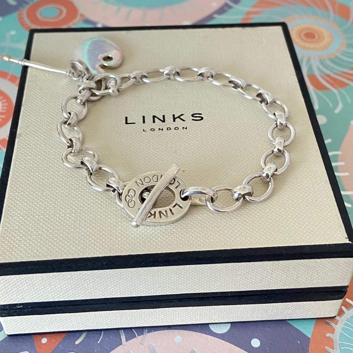 Links of London T-Bar Signature Bracelet with the Artist Pallet and Brush Charm.