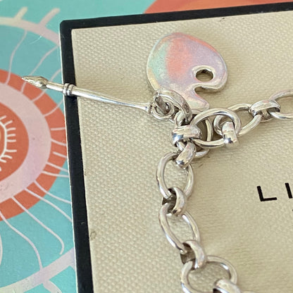 Links of London T-Bar Signature Bracelet with the Artist Pallet and Brush Charm.