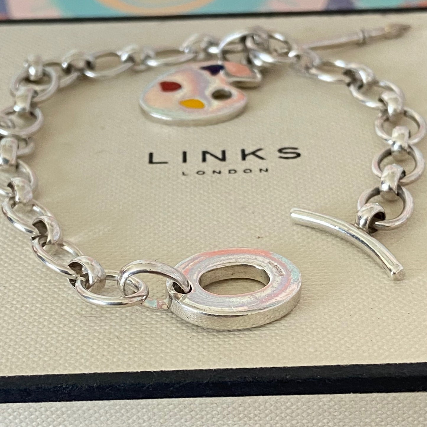 Links of London T-Bar Signature Bracelet with the Artist Pallet and Brush Charm.