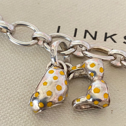 Links of London T-Bar Signature Bracelet with a Flip Flop and Yellow Polka Dot Bikini.