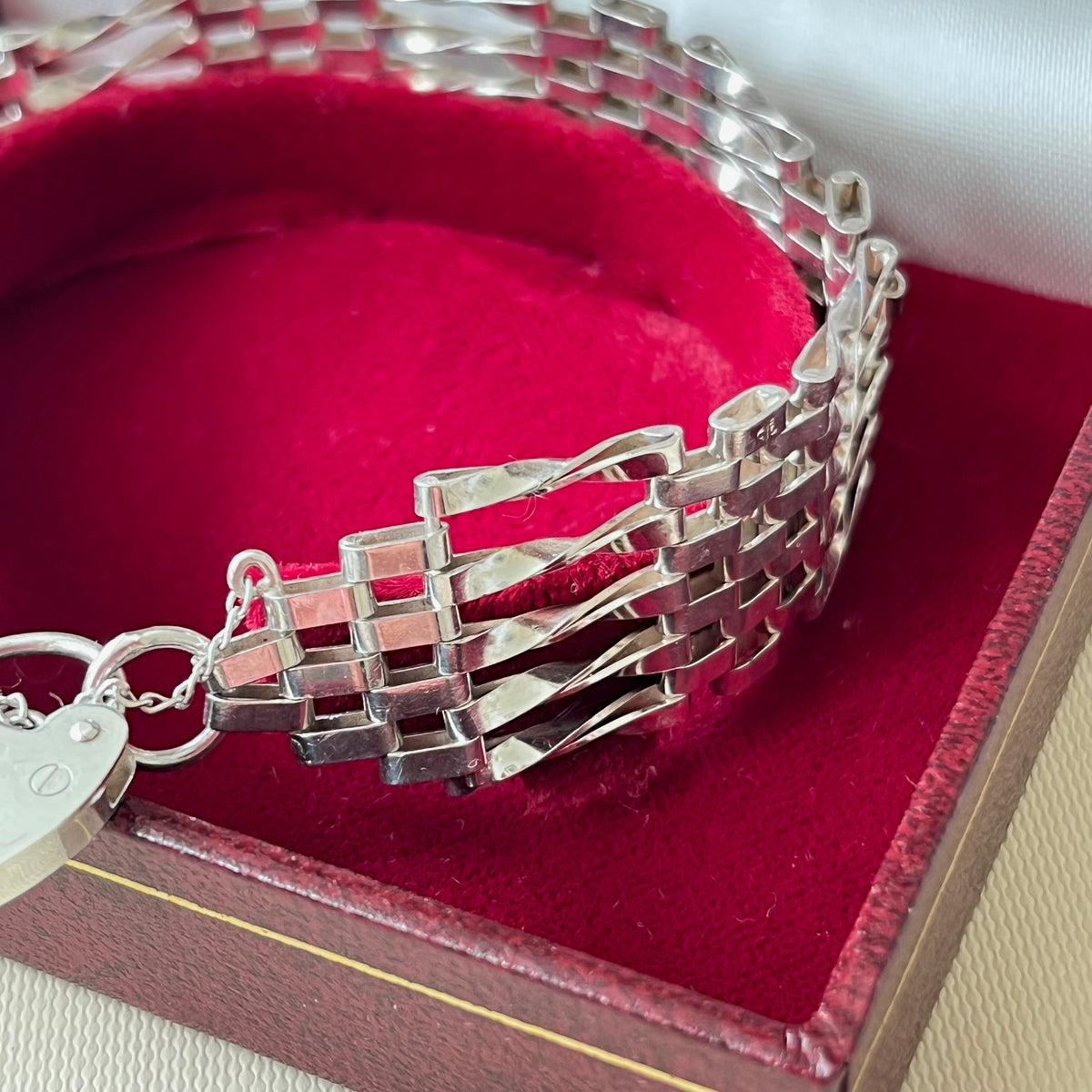 Sterling Silver 5 Gate Vintage Bracelet Stamped 925 with the Heart Lock Charm and safety chain.  22grams of Sterling Silver