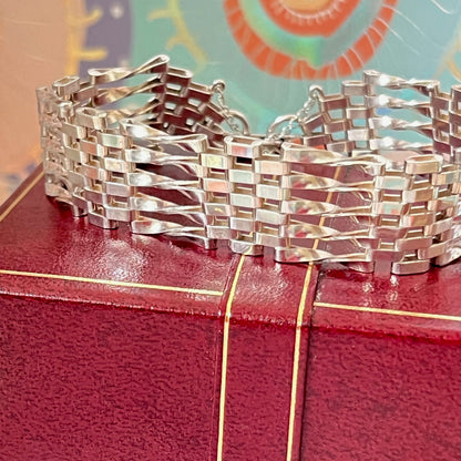 Sterling Silver 5 Gate Vintage Bracelet Stamped 925 with the Heart Lock Charm and safety chain.  22grams of Sterling Silver
