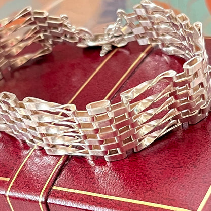 Sterling Silver 5 Gate Vintage Bracelet Stamped 925 with the Heart Lock Charm and safety chain.  22grams of Sterling Silver