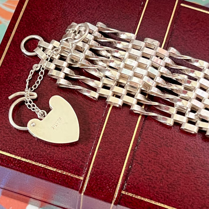 Sterling Silver 5 Gate Vintage Bracelet Stamped 925 with the Heart Lock Charm and safety chain.  22grams of Sterling Silver